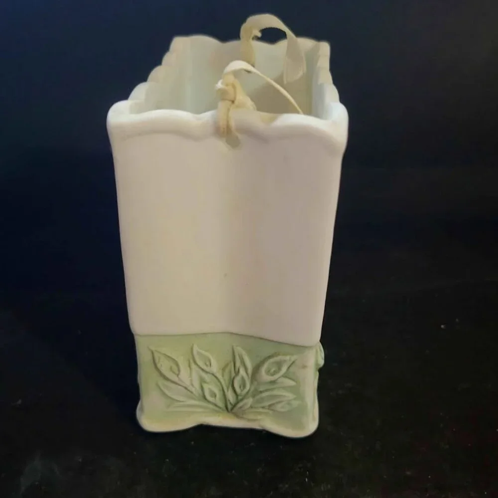 Vintage Porcelain Basket With Floral Embellishments And Decorative Ribbon